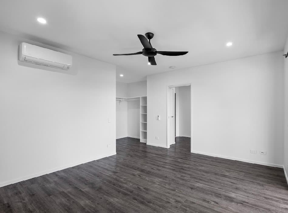 Completed bedroom electrical fit-out with air conditioning, ceiling fan and downlights